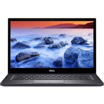 Dell Laptop displaying a scenic wallpaper of rocks and water on a white background