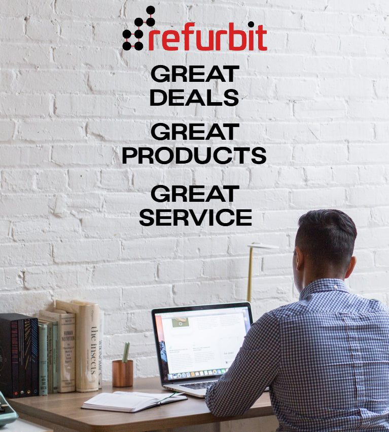 Person working at a desk with a window and white brick wall, featuring the Refurbit brand. Dell, HP, Lenovo, refurbished used computers.